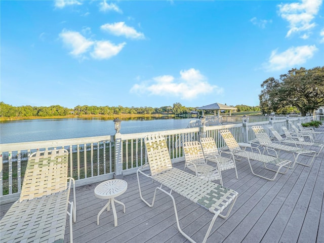 wooden terrace with a water view