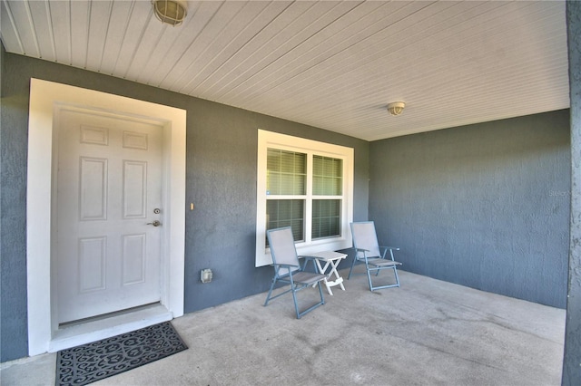 view of patio featuring covered porch