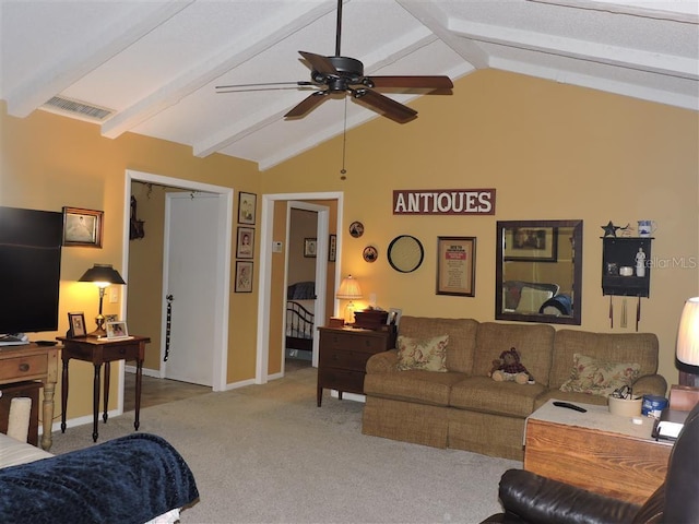 carpeted living room featuring lofted ceiling with beams and ceiling fan