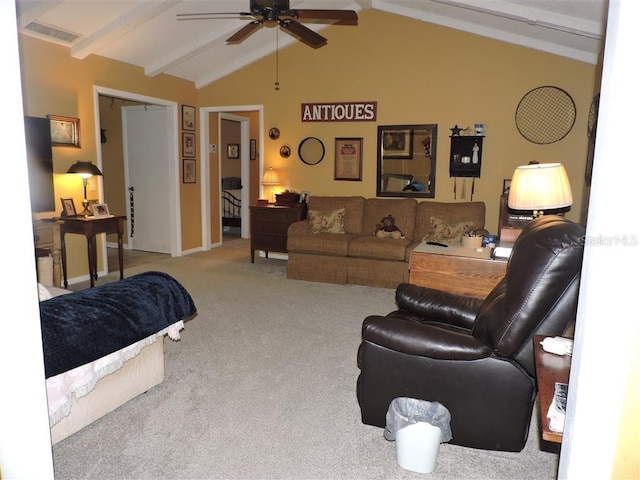 living room with ceiling fan, light colored carpet, and lofted ceiling with beams