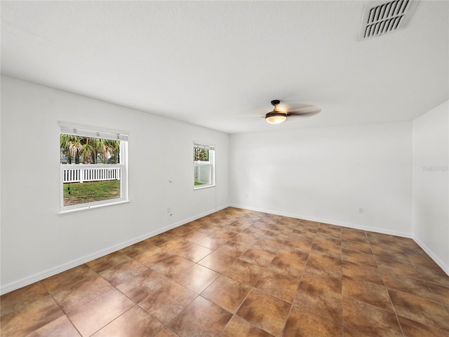 spare room featuring ceiling fan