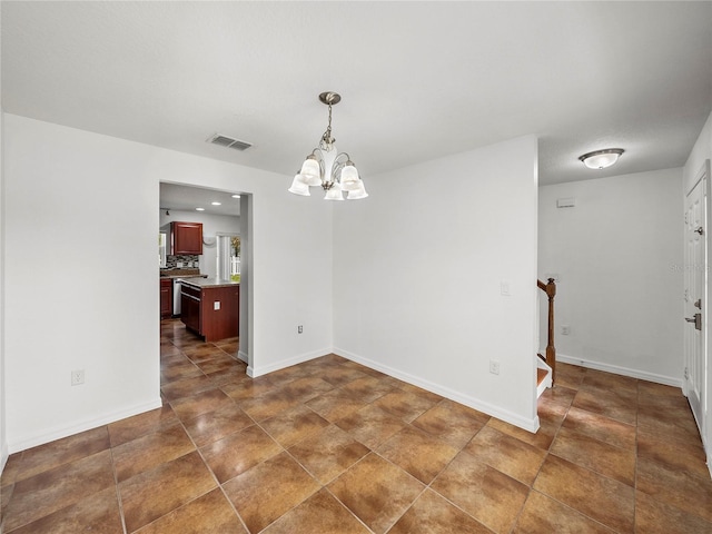 unfurnished dining area with a notable chandelier