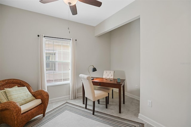 tiled office space with ceiling fan