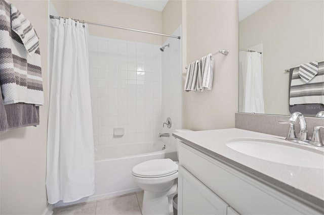 full bathroom with tile patterned flooring, vanity, shower / bath combination with curtain, and toilet