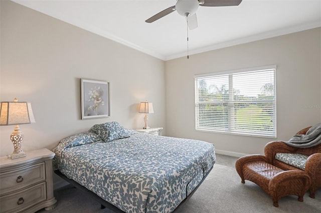 bedroom featuring carpet flooring, ceiling fan, and ornamental molding