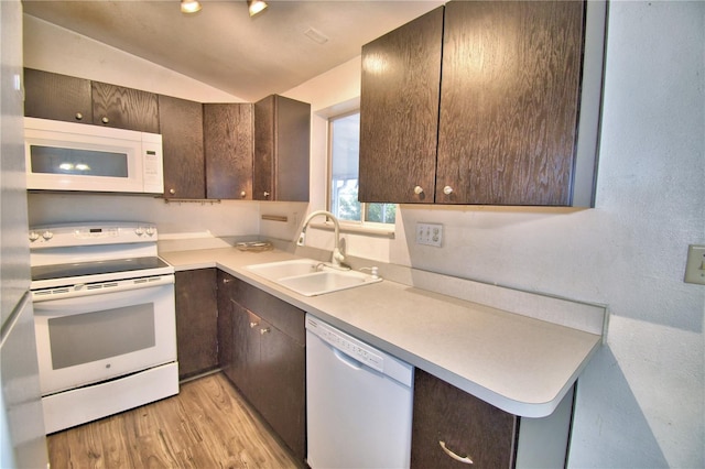 kitchen with light hardwood / wood-style floors, white appliances, lofted ceiling, dark brown cabinets, and sink