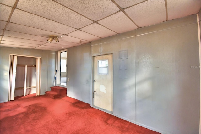 interior space featuring a paneled ceiling