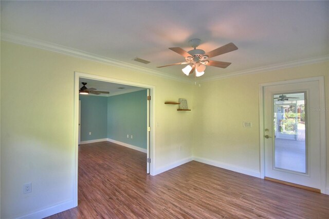 112 Reedy Creek Dr, Frostproof, FL 33843 - spare room featuring a ceiling fan, crown molding, and dark wood-style floors