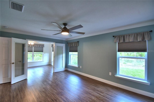 112 Reedy Creek Dr, Frostproof, FL 33843 - empty room featuring a ceiling fan, ornamental molding, and dark wood-style floors