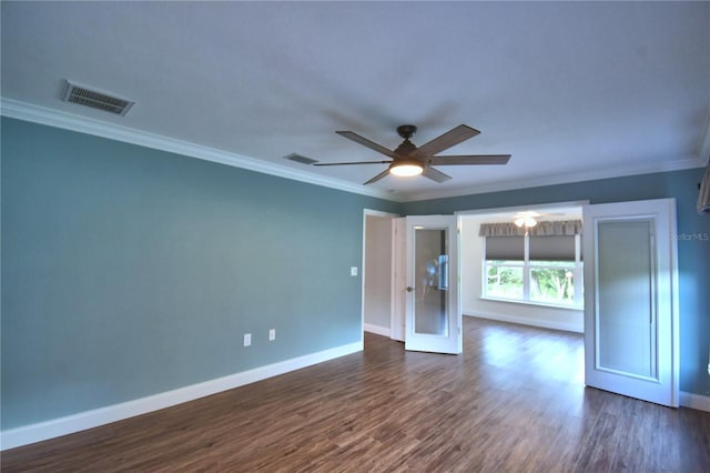 112 Reedy Creek Dr, Frostproof, FL 33843 - empty room featuring dark wood-type flooring, ceiling fan, and ornamental molding
