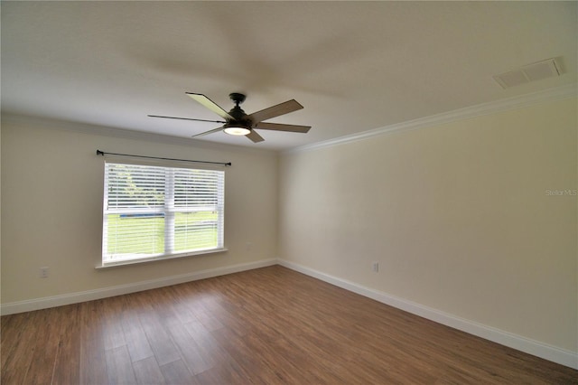 112 Reedy Creek Dr, Frostproof, FL 33843 - empty room featuring ceiling fan, wood finished floors, and crown molding