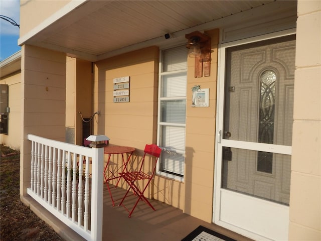 doorway to property featuring a porch