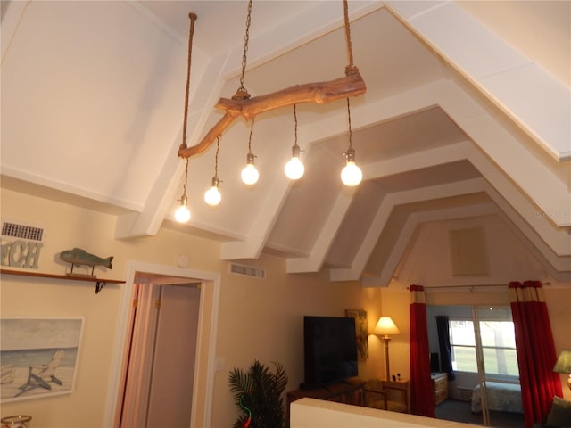 interior space featuring vaulted ceiling with beams