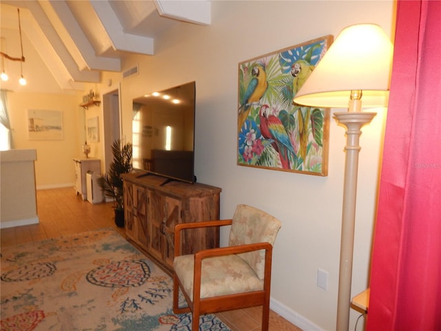 living area with light hardwood / wood-style floors