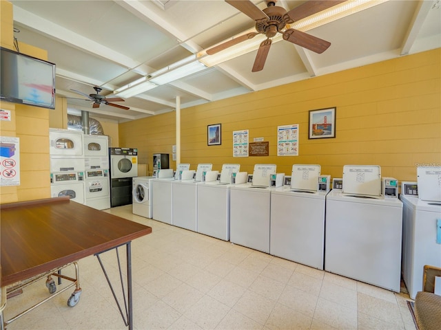 clothes washing area with ceiling fan, washing machine and clothes dryer, and stacked washer and dryer