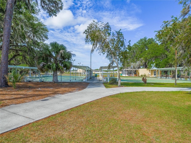 view of community featuring a lawn