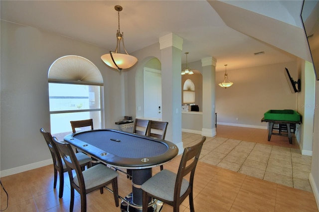 rec room featuring visible vents, light tile patterned floors, baseboards, and arched walkways