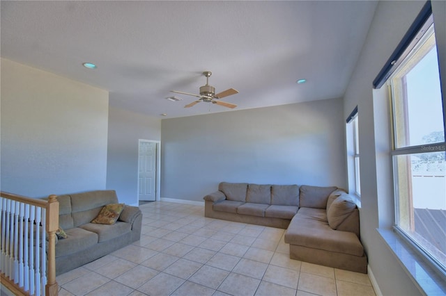 living area featuring light tile patterned floors, visible vents, recessed lighting, and baseboards