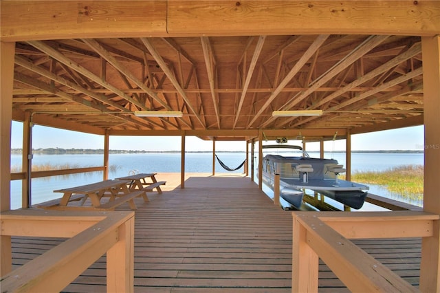 dock area featuring a water view and boat lift