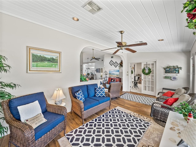 living room featuring wood ceiling, ceiling fan, and hardwood / wood-style floors