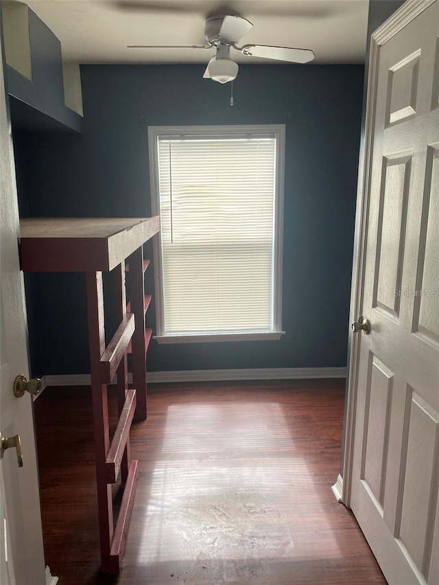 bedroom featuring hardwood / wood-style floors and ceiling fan