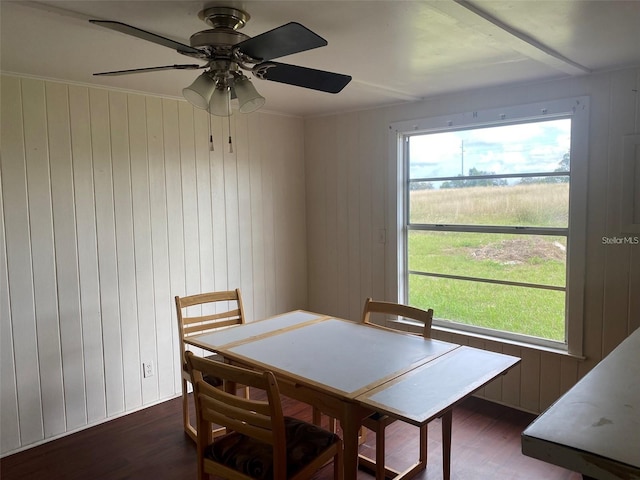 dining space featuring dark hardwood / wood-style floors