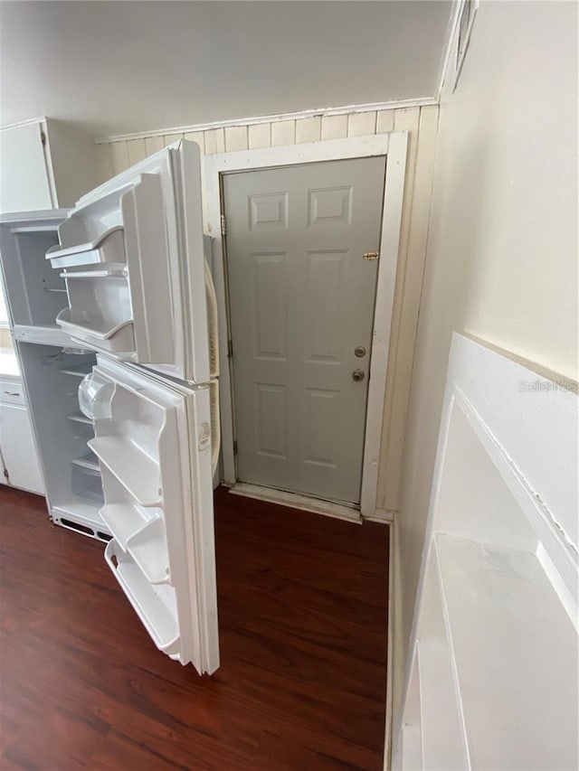 doorway featuring dark hardwood / wood-style floors