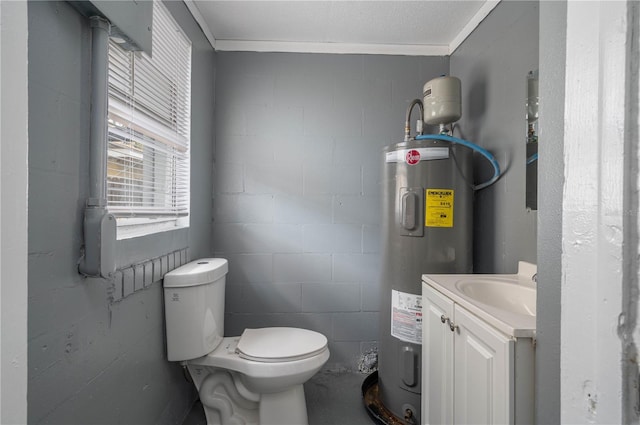 bathroom with vanity, concrete block wall, electric water heater, crown molding, and toilet