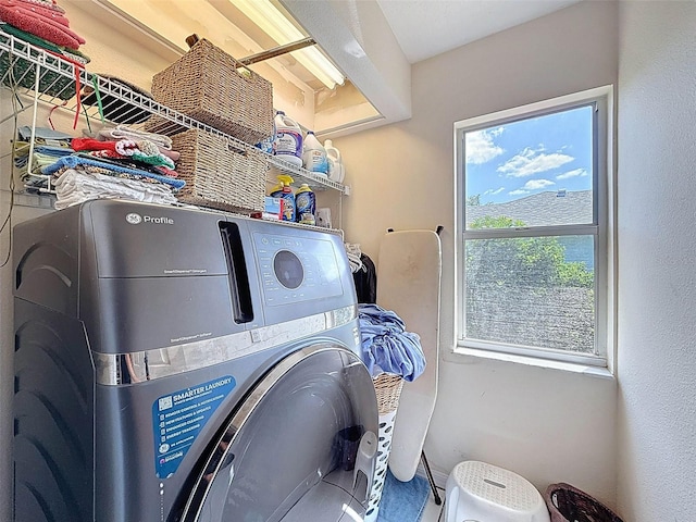 laundry area with washer / dryer and laundry area