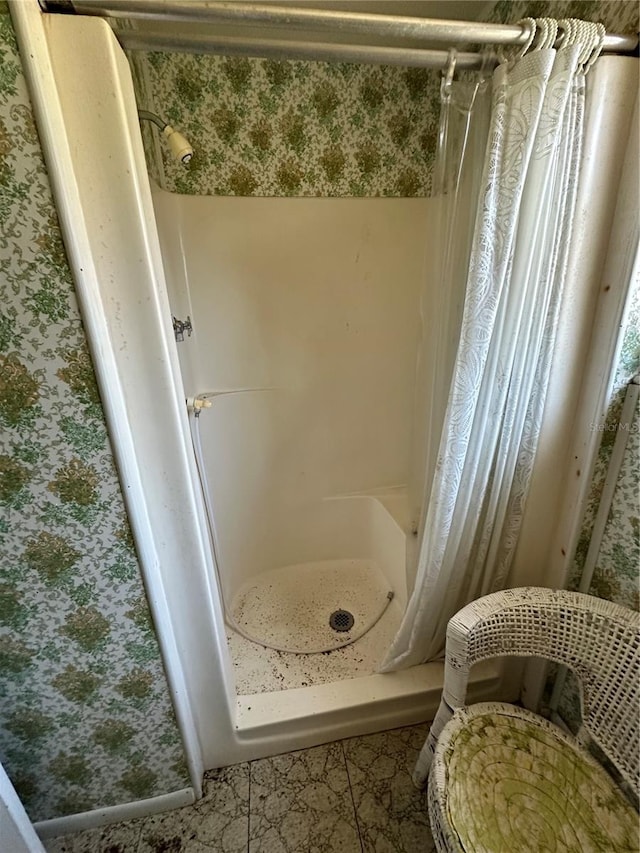 bathroom with a stall shower