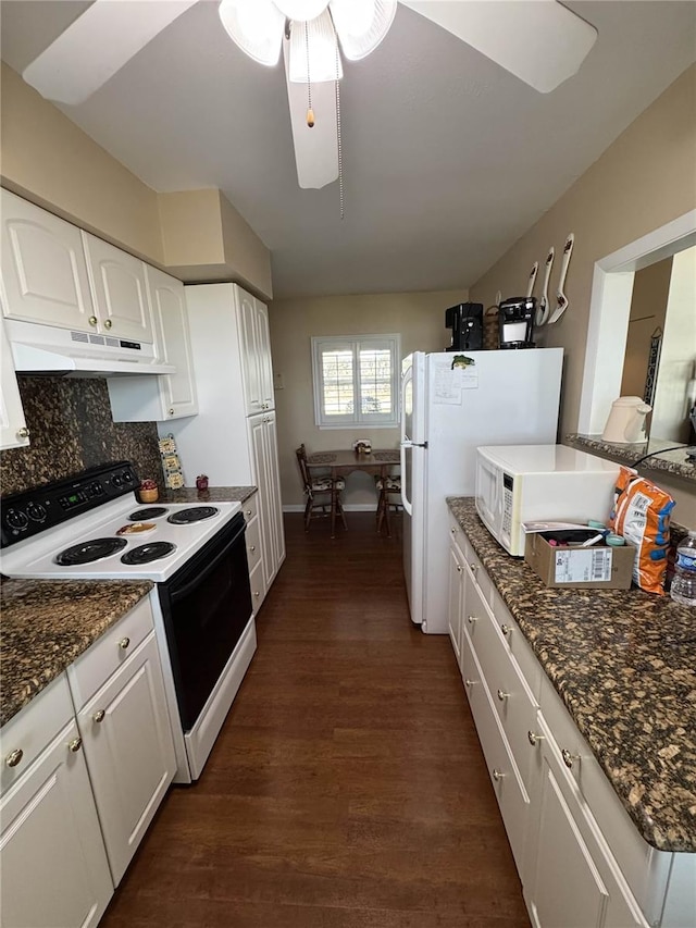 kitchen featuring white microwave, under cabinet range hood, electric range, dark wood-type flooring, and white cabinets