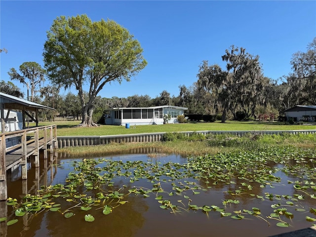 view of dock with a water view