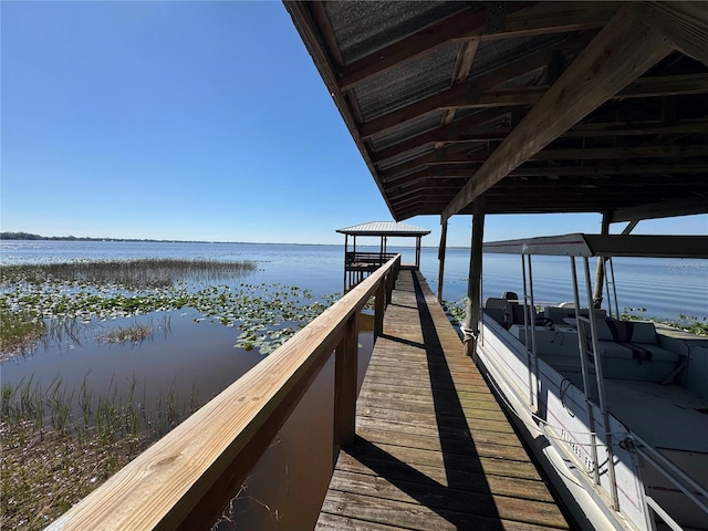 dock area featuring a water view