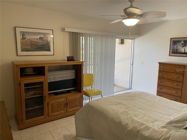 bedroom with a ceiling fan and access to outside