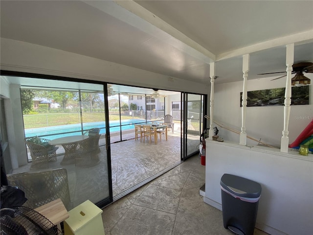 entryway with a ceiling fan