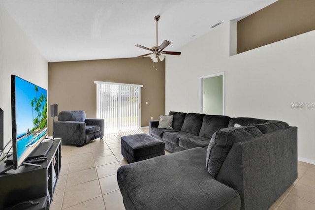 living room with high vaulted ceiling, visible vents, ceiling fan, and light tile patterned floors