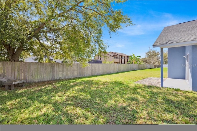 view of yard featuring a fenced backyard