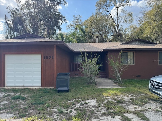 view of front of house featuring a front lawn, roof with shingles, a garage, crawl space, and driveway