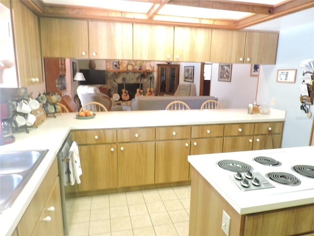 3567 Red Oak Ct, Lake Wales, FL 33898 - kitchen featuring light countertops, stainless steel dishwasher, light tile patterned floors, a sink, and white electric stovetop