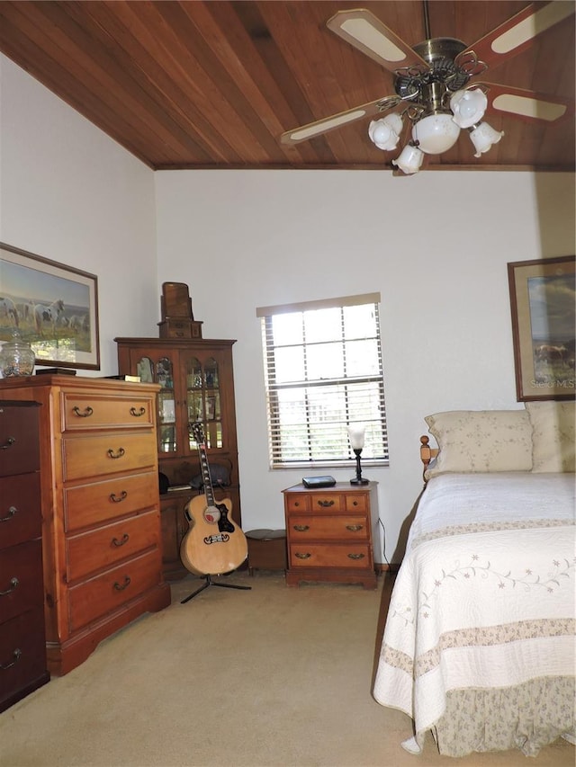 3567 Red Oak Ct, Lake Wales, FL 33898 - bedroom with light colored carpet, wood ceiling, and ceiling fan