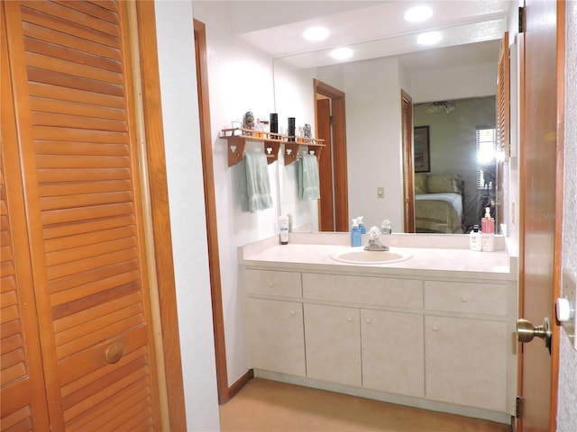 3567 Red Oak Ct, Lake Wales, FL 33898 - bathroom featuring vanity, a closet, recessed lighting, and ensuite bathroom