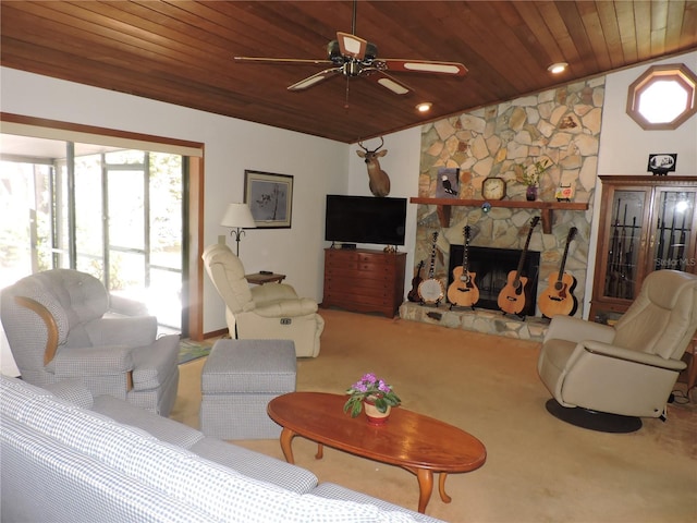 3567 Red Oak Ct, Lake Wales, FL 33898 - carpeted living room featuring wooden ceiling, ceiling fan, and a stone fireplace