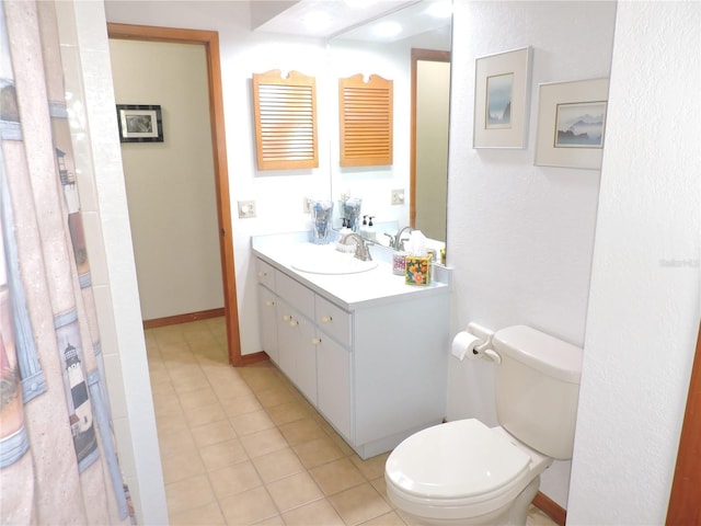 3567 Red Oak Ct, Lake Wales, FL 33898 - bathroom with vanity, toilet, and tile patterned flooring