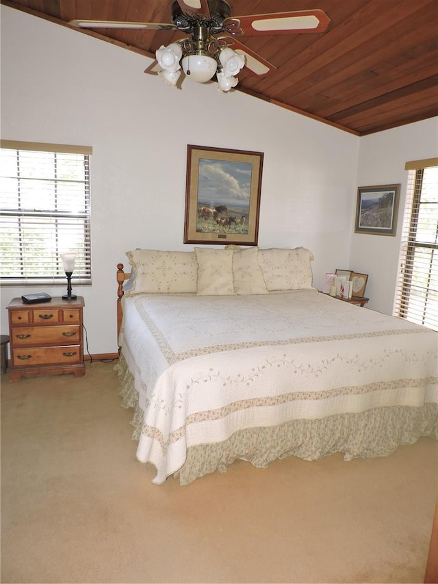 3567 Red Oak Ct, Lake Wales, FL 33898 - bedroom with wood ceiling, vaulted ceiling, carpet, a ceiling fan, and baseboards