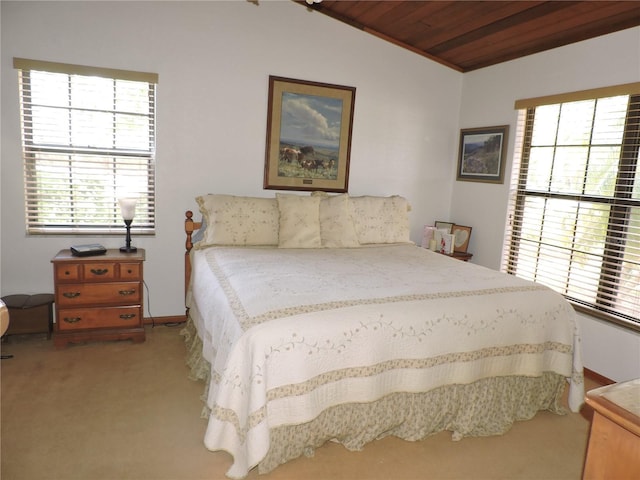 3567 Red Oak Ct, Lake Wales, FL 33898 - bedroom with carpet, multiple windows, wooden ceiling, vaulted ceiling, and baseboards