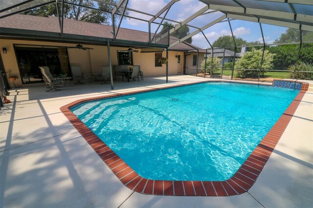 3567 Red Oak Ct, Lake Wales, FL 33898 - swimming pool with ceiling fan, a patio area, and a lanai
