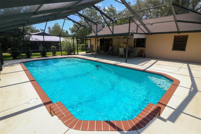 3567 Red Oak Ct, Lake Wales, FL 33898 - outdoor pool with a patio and glass enclosure