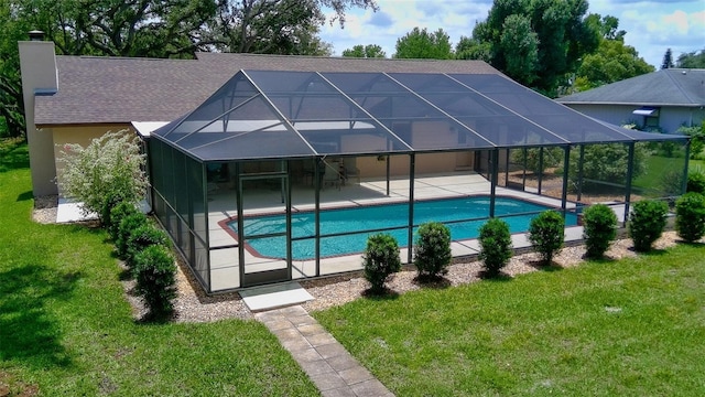 3567 Red Oak Ct, Lake Wales, FL 33898 - swimming pool featuring a patio area, a yard, and a lanai