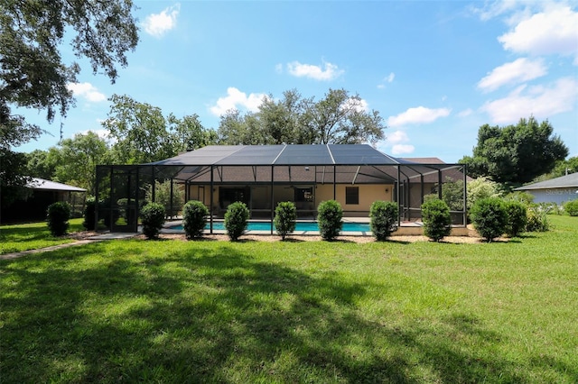 3567 Red Oak Ct, Lake Wales, FL 33898 - rear view of house featuring an outdoor pool, a yard, and a lanai