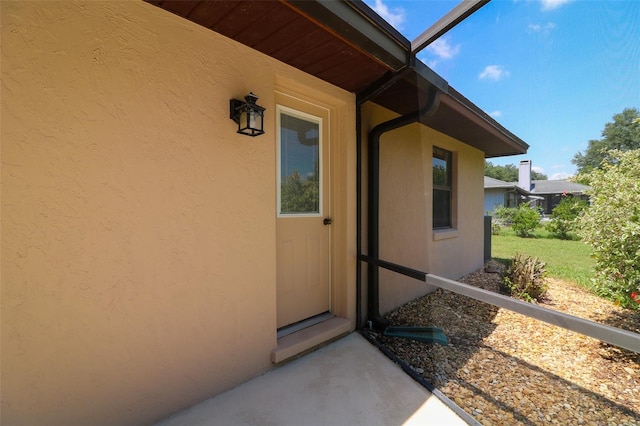 3567 Red Oak Ct, Lake Wales, FL 33898 - view of exterior entry featuring stucco siding
